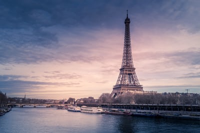 eiffel tower against a clowded sky in paris france