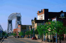 view of city buildings with ore bridge in background in duluth minnesota