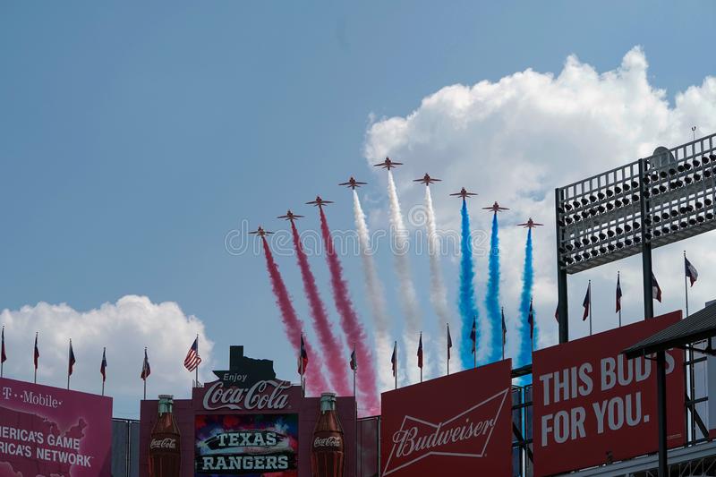 nine jets display red white and blue over arlington flight